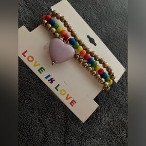 Love is love three stretchy bracelets.